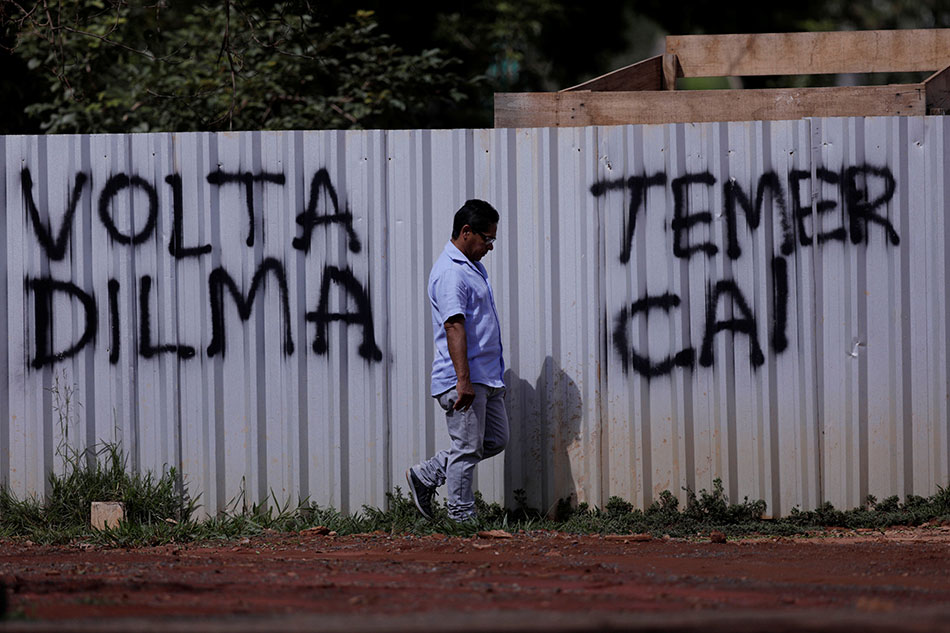 Brazil's Temer loses another aide as pressure mounts