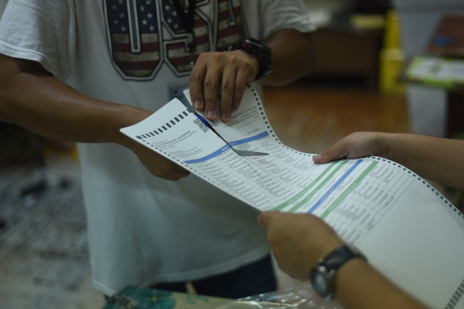  Teachers and volunteers destroy remaining excess ballots as they wrap up at a polling precinct at the Aurora A. Quezon elementary school in Manila on May 13, 2019. George Calvelo, ABS-CBN News