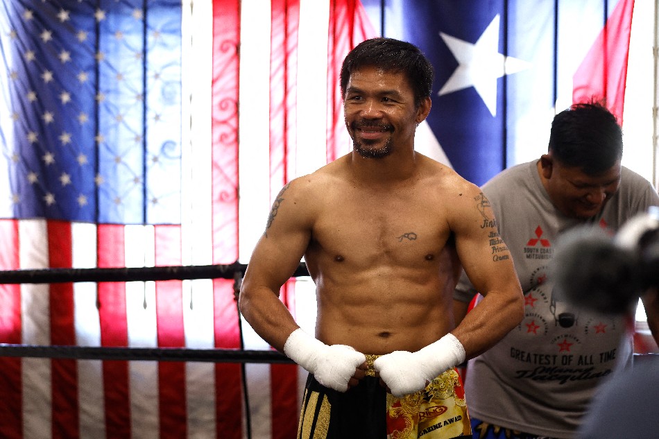 Manny Pacquiao poses for media at Wild Card Boxing Club on August 4, 2021 in Los Angeles. Michael Owens, Getty Images via AFP