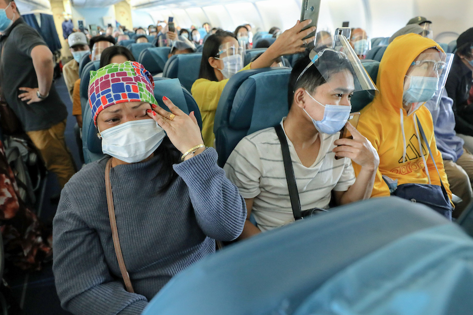 Some 301 repatriates, including 6 infants, from the Kingdom of Saudi Arabia are brought home to Ninoy Aquino International Airport Terminal 1 via a Philippine Airlines chartered flight on June 25, 2021. Presidential Photos/File