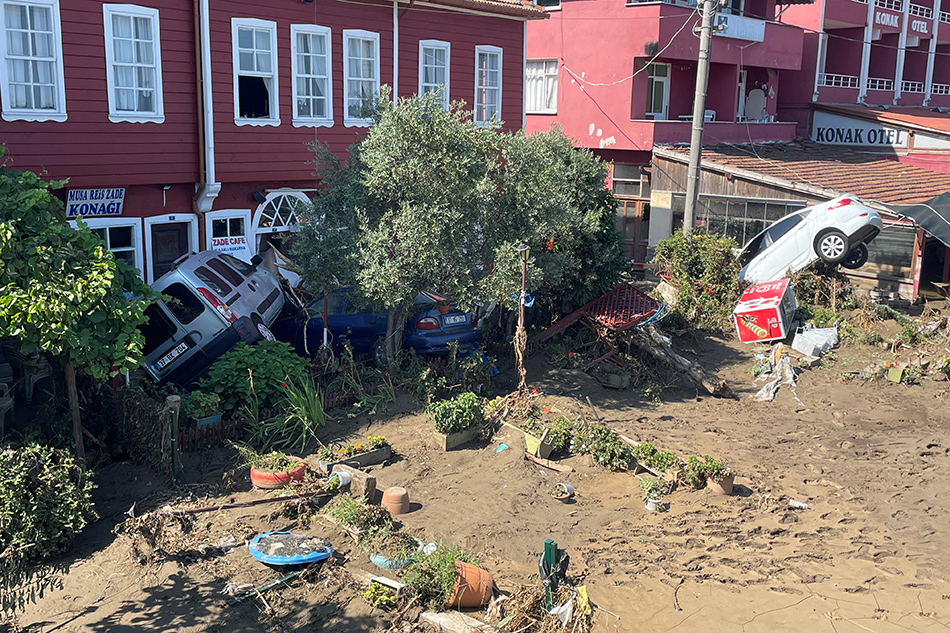 Damaged vehicles are seen following the flash floods that swept through towns in the Turkish Black Sea region