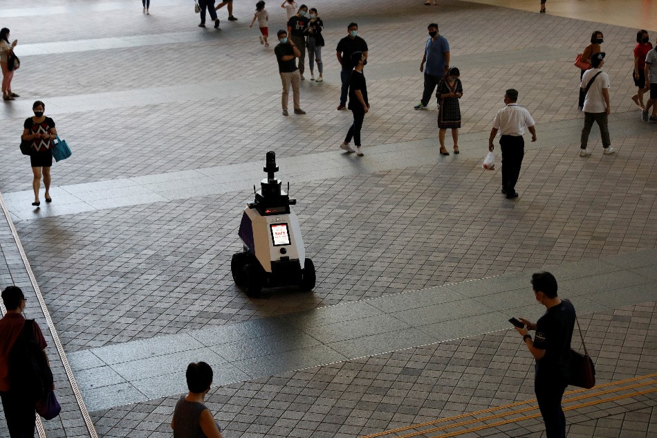 Autonomous robot Xavier patrols a neighborhood mall to detect 