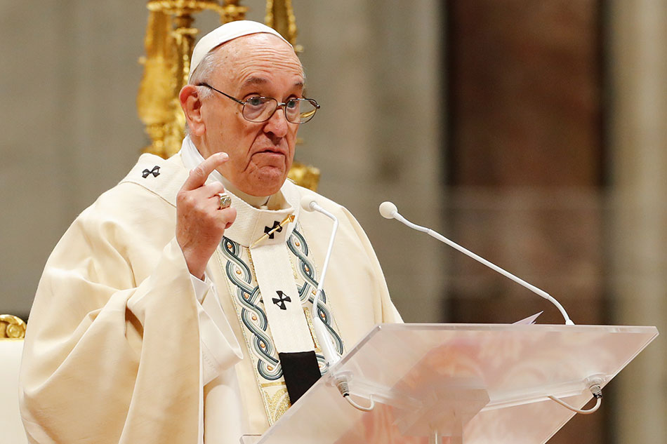 Pope Francis leads a mass to ordain bishops at St. Peter