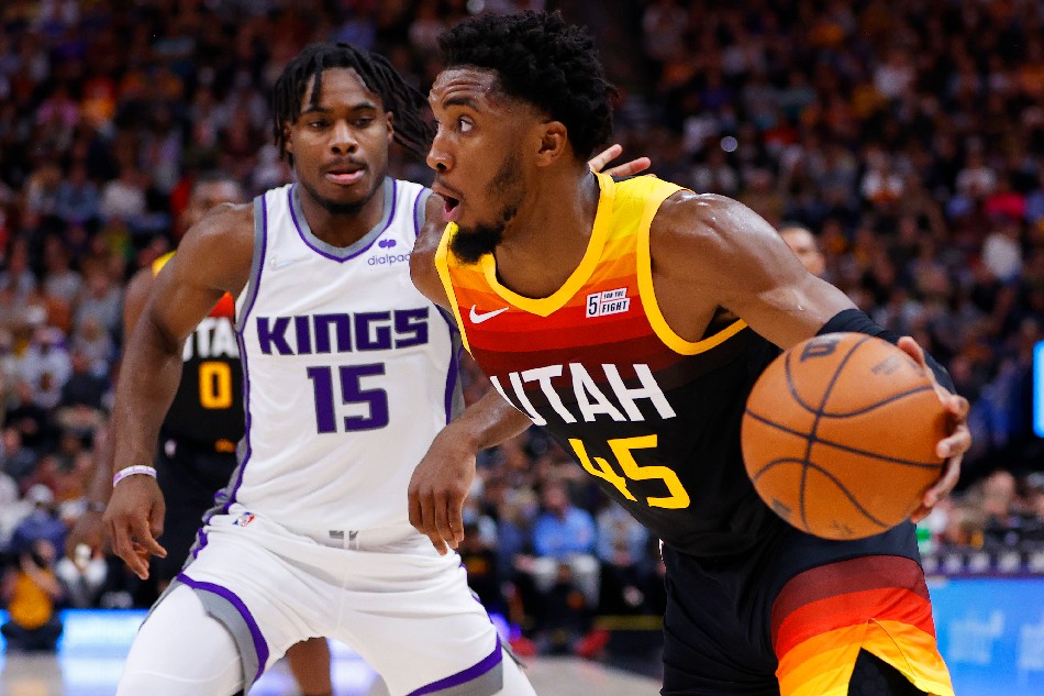 Utah Jazz guard Donovan Mitchell (45) drives past Sacramento Kings guard Davion Mitchell (15) in the third quarter at Vivint Arena. Jeffrey Swinger, USA TODAY Sports/Reuters
