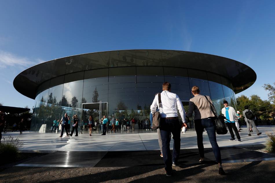 Guests arrive at the Steve Jobs Theater for an Apple event at their headquarters in Cupertino, California, U.S., September 10, 2019. Stephen Lam, Reuters/File
