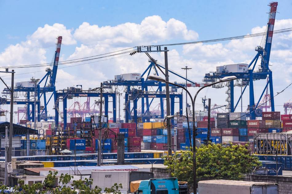 Container vans stacked together are seen inside the Philippine Ports Authority (PPA) compound in Manila on April 1, 2020. George Calvelo, ABS-CBN News/File