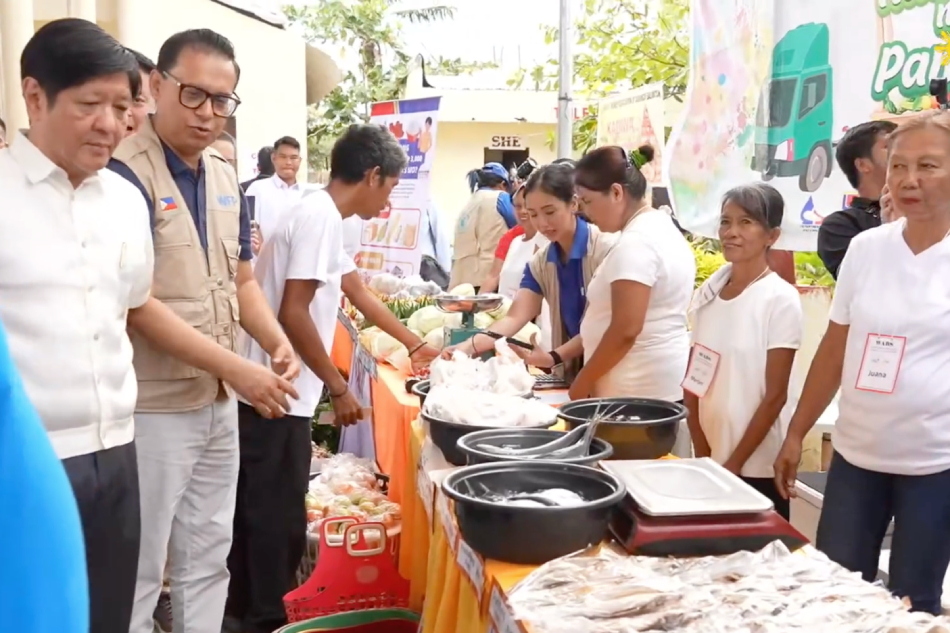 Marcos Leads Launch Of Government Food Stamp Program In Surigao