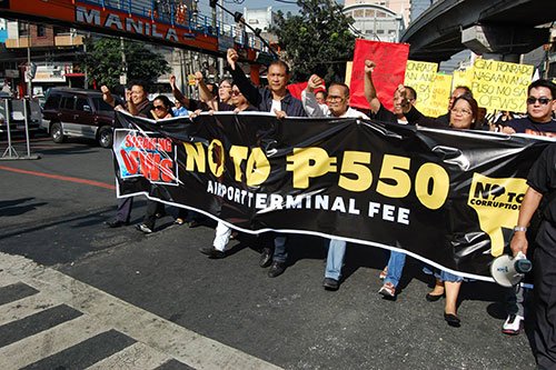 OFW groups say no to airport terminal fee integration 1