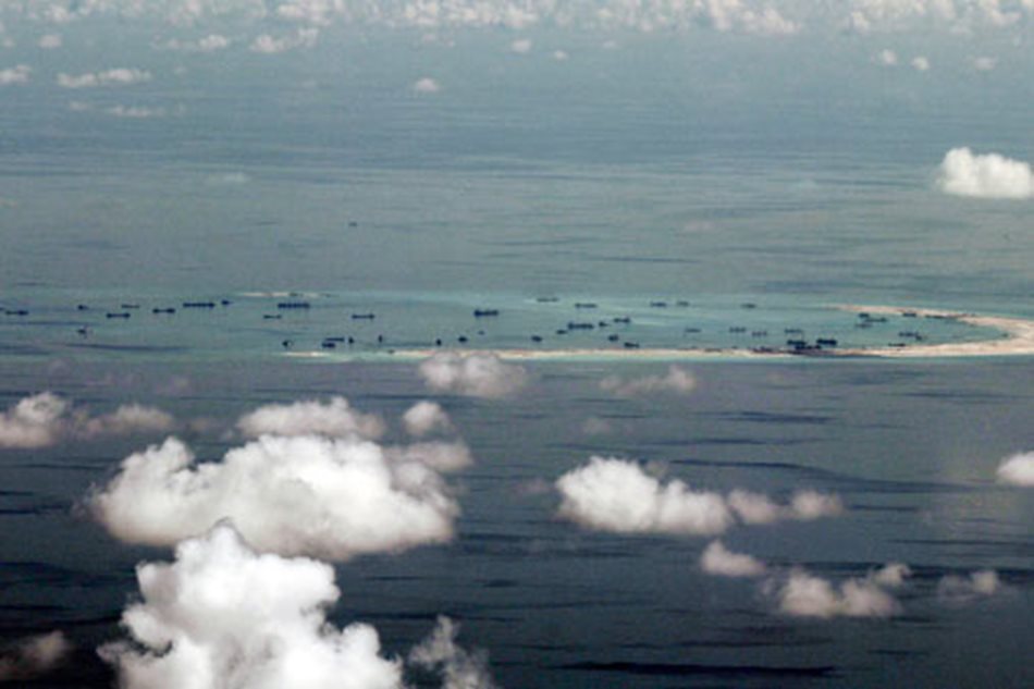 Beijing vows to continue S. China Sea construction 1