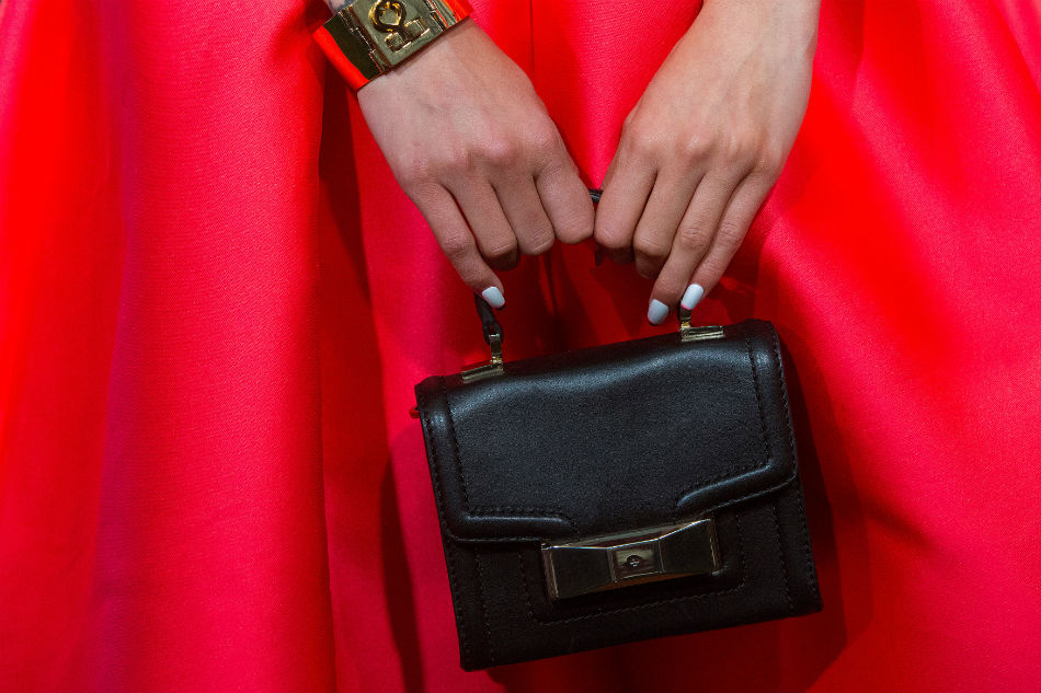 Coach To Rival Handbag Maker Kate Spade For 2 4 B Abs Cbn News Coach To Rival Handbag Maker Kate Spade For 2 4 B