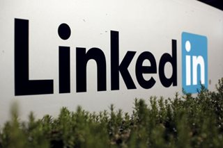 LinkedIn China suspends new sign-ups to 'respect law'