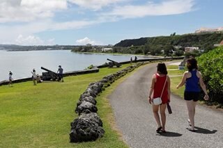 Guam halts 'vacation-and-vax' tours 