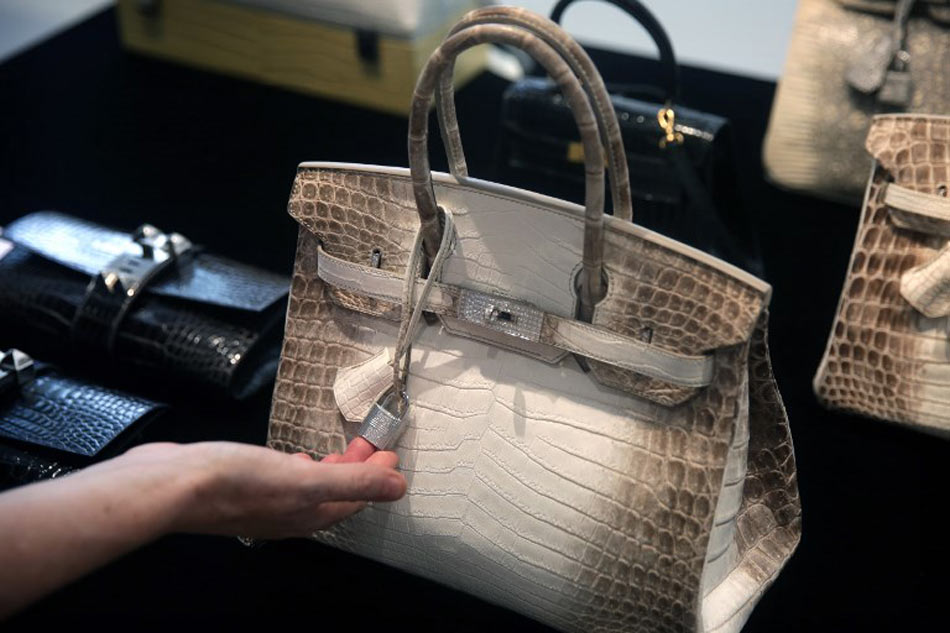 Crocodile-skin Hermes handbag sells for a record $222,912 at