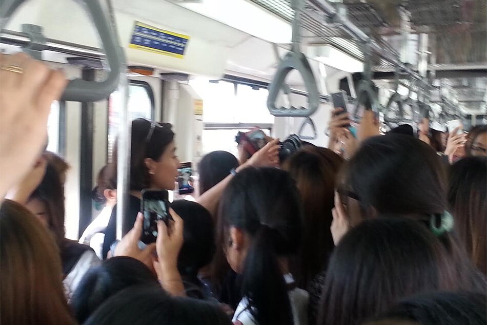 LOOK: For the 3rd time, Anne Curtis was spotted riding the MRT 2