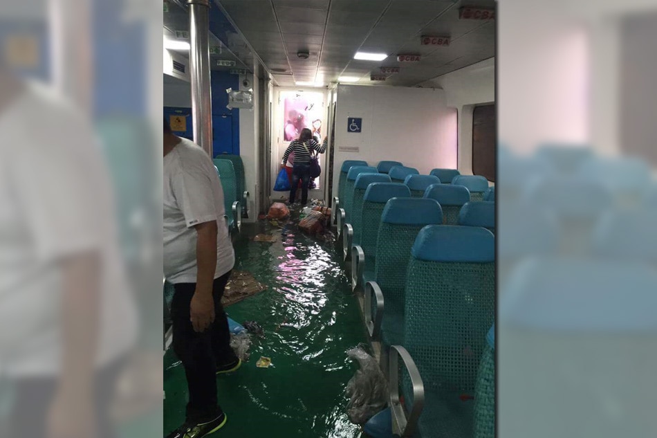 LOOK: Ferry takes on water off Calapan port | ABS-CBN News