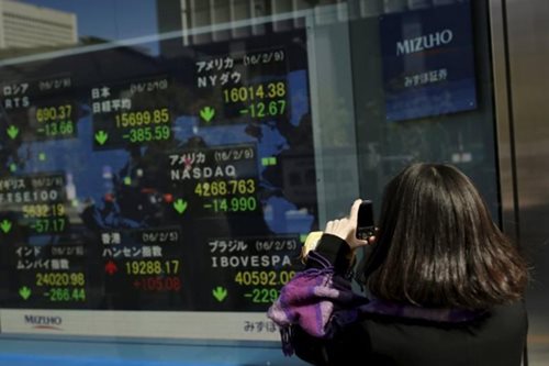 Asian stocks at 2-week high as Trump returns to White House