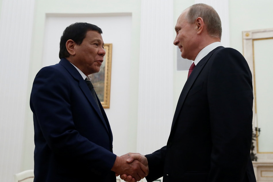 President Duterte shakes hand with Russian President Vladimir Putin during their meeting at the Kremlin in Moscow on May 24, 2017. Maxim Shemetov, Reuters/file
