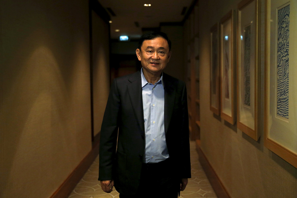 Former Thai PM Thaksin to be charged with royal insult 1