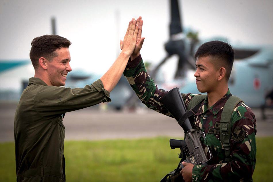 Philippine and American soldiers raise a high five during a joint exercise in Luzon in October 2017. United States Embassy in the Philippines/File