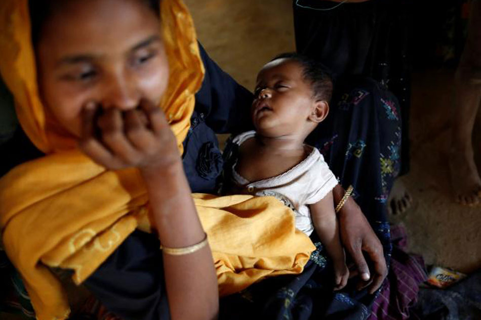 A Rohingya Child Sleeps On Mothers Lap Inside Their House At Balukhali Makeshift Refugee Camp In Coxs Bazar Bangladesh Wednesday A Rohingya Child Sleeps On Mothers Lap Inside Their House At Balukhali Makeshift Refugee Camp In Coxs Bazar Bangladesh Wednesday