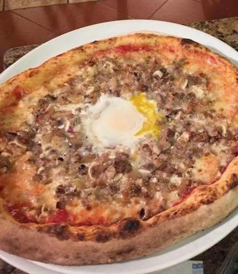 Former Pinoy dishwasher now owner of pizzeria in Italy 3