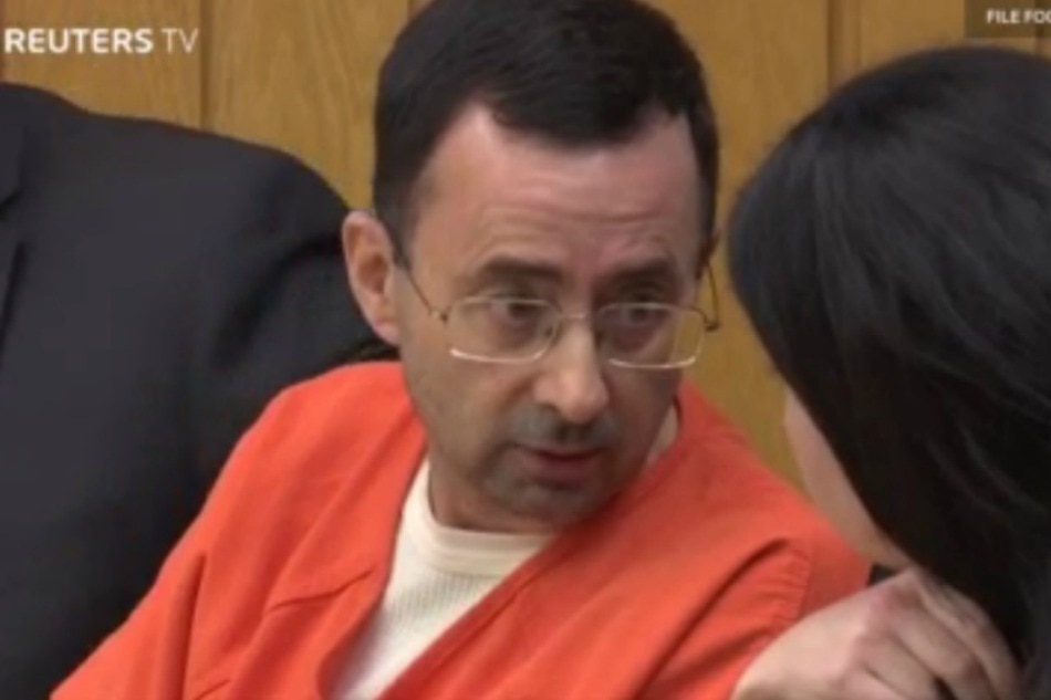 Doctor accused of molesting US gymnasts pleads guilty to ...