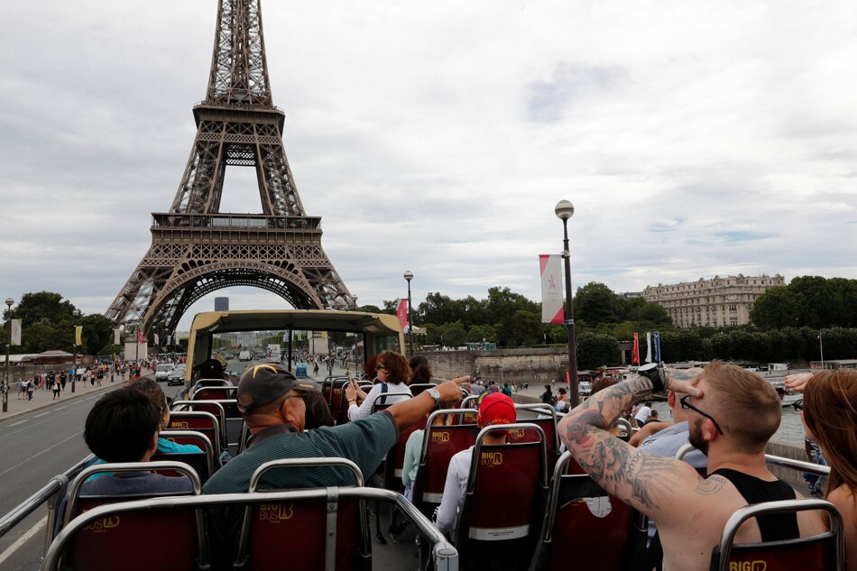 Nudists get their place in the sun at Paris park | ABS-CBN News