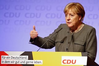 Contradicting Trump, Merkel says Islamic State not yet defeated