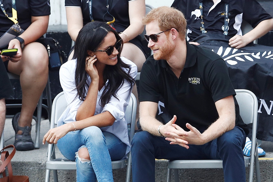 Britains Prince Harry Makes First Public Appearance With Girlfriend Abs Cbn News 