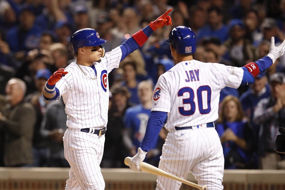 Baez bashes two homers as Cubs stay alive