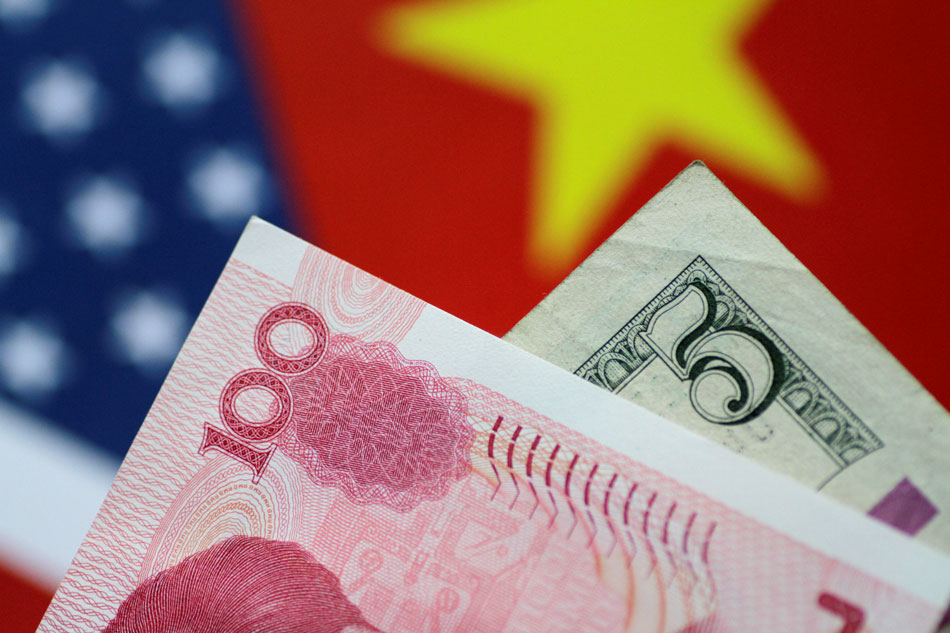 Philippines China Elish Yuan Trading Community Abs Cbn News Us Dollar And China Yuan Notes Are Seen In This Picture Ilration Thomas White Reuters File