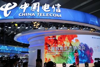 China Telecom rises marginally in Shanghai debut