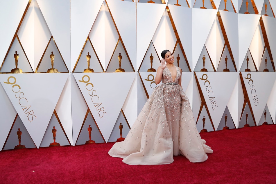 Oscars red carpet filled with color after tumultuous Hollywood year