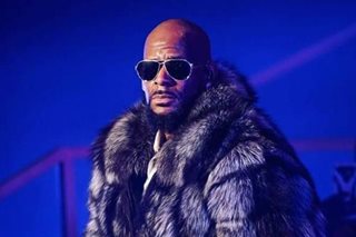 R. Kelly charged with 10 counts of sex abuse in Chicago