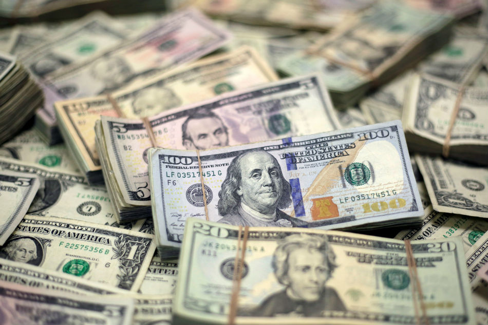 Peso Hovers At P52 1 On Pressure From Imports Abs Cbn News Us Dollar Banknotes Are Seen In This Photo Ilration Taken February 12 2018 Jose Luis Gonzalez Reuters