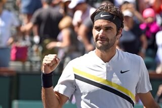 Tennis: Federer takes century quest to Dubai