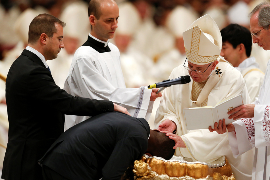 Pope Baptizes Italy 'Migrant Hero' at Easter Eve Service