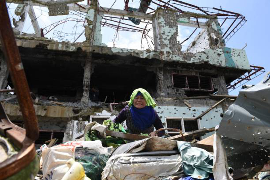 Painful homecoming in battle-torn Marawi | ABS-CBN News