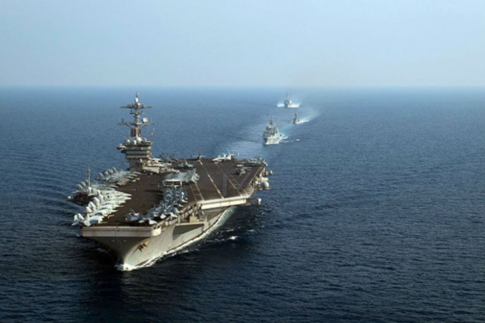 US displays military muscle as carrier sails in South China Sea 1