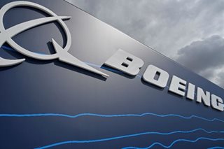 Battered by pandemic, Boeing cutting 30,000 jobs in two years