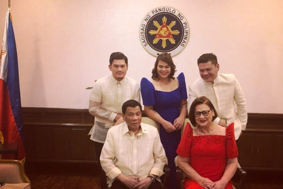 Duterte takes rare photo with 'first' family ABS CBN News