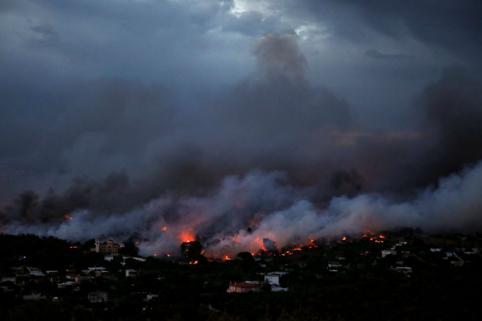 Greek wildfire kills at least 24 near Athens, residents flee homes 2