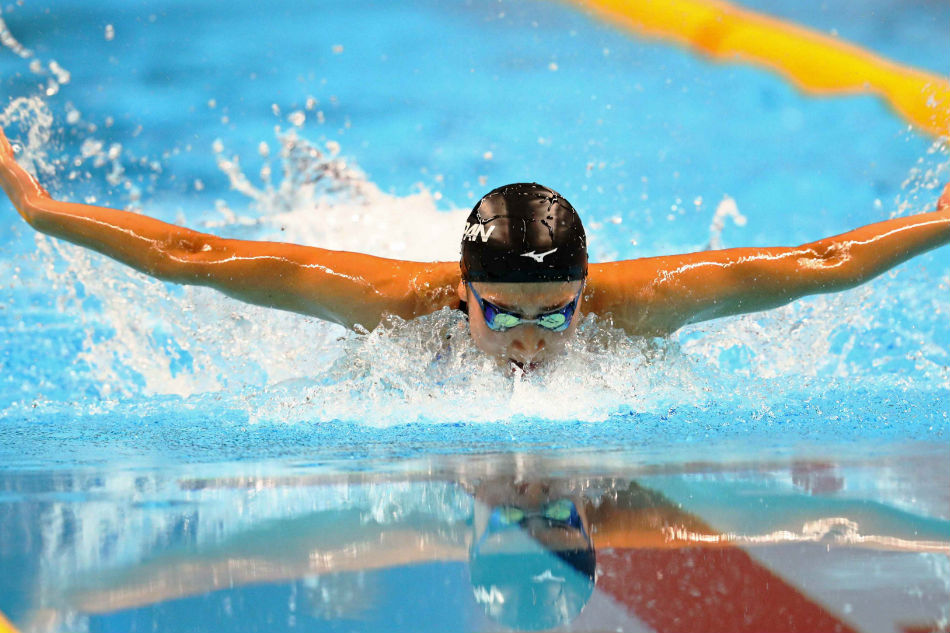 Rikako Ikee of Japan competes 2018 Asian Games' Women's 100m butterfly. Athit Perawongmetha Reuters