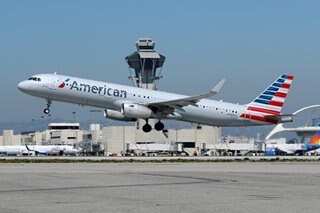 American Airlines resumes trying to pack planes as virus cases surge