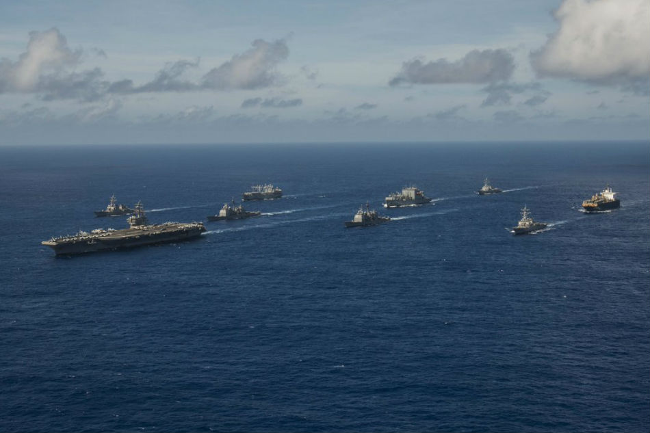 latest news on us warship sails in show of force