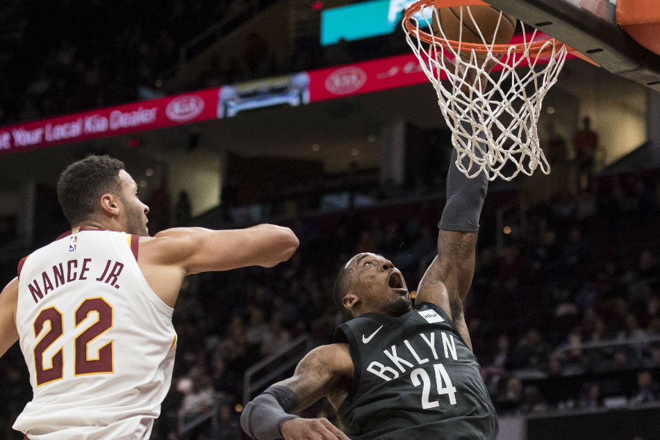 Russell, Harris lead Nets past winless Cavaliers 102-86