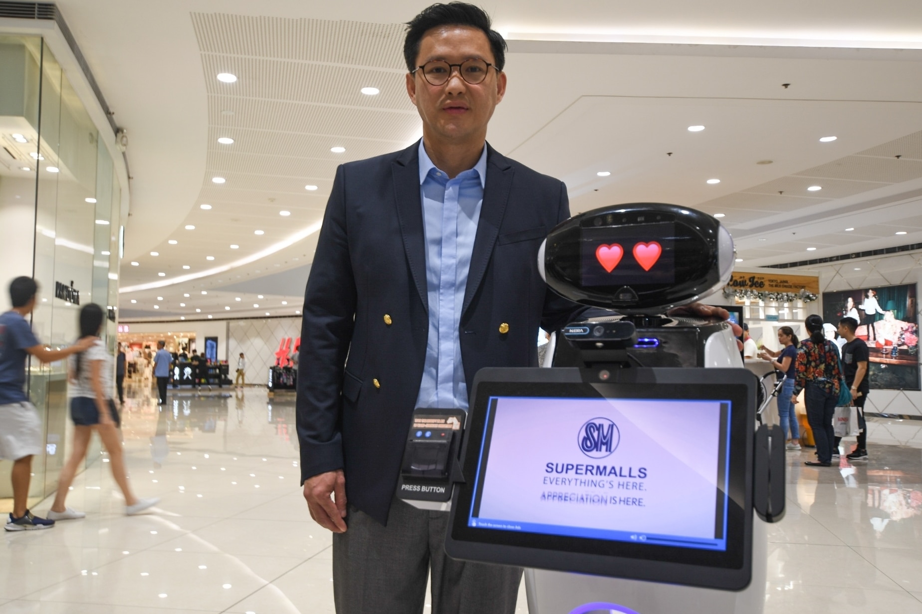 Robot concierge coming to SM as Henry Sy turns to AI 2