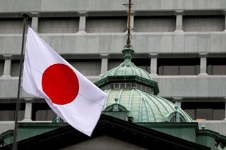 Bank of Japan lifts growth forecast, keeps policy unchanged