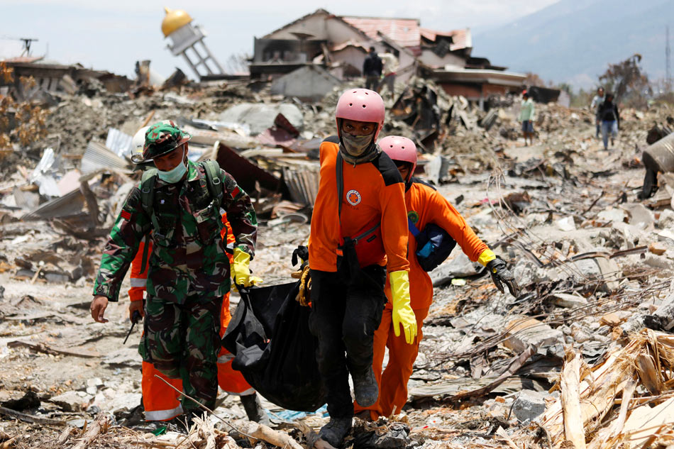 Indonesia mulls leaving quake-flattened villages as mass graves | ABS ...