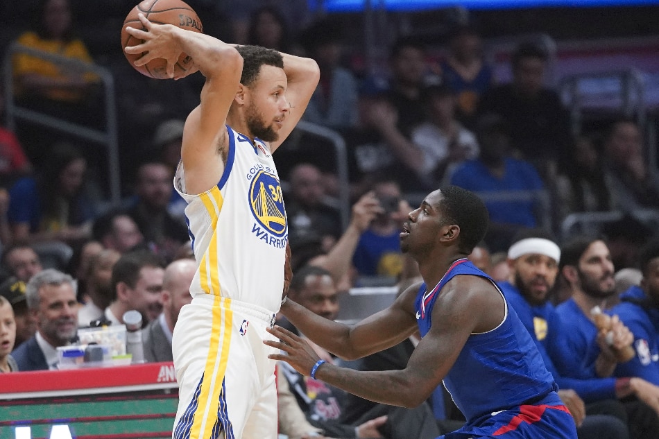 Curry scores 45 in 3 quarters as Warriors rout Clips | ABS-CBN News